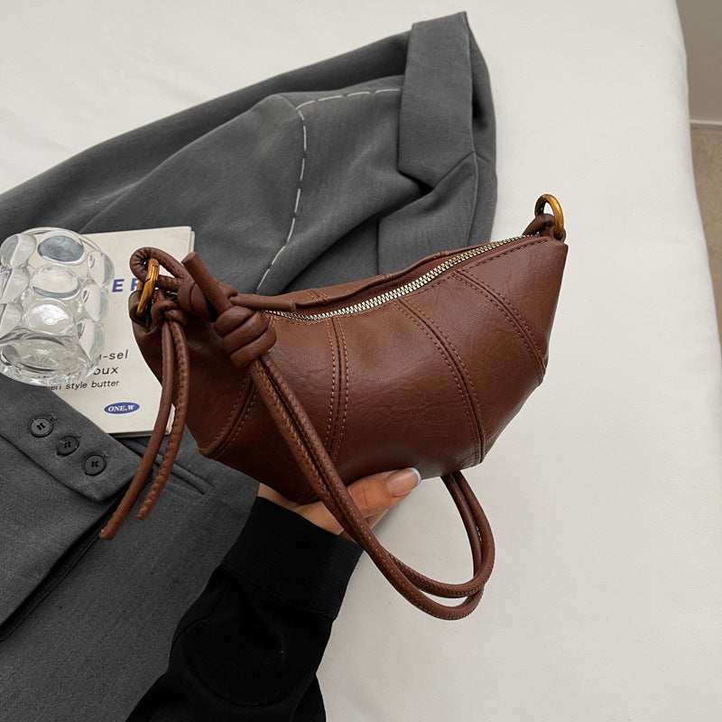 Damen-Crossbodytasche in Hornform