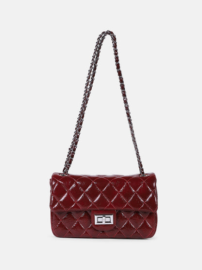 Rhombus Twist-Lock Schultertasche